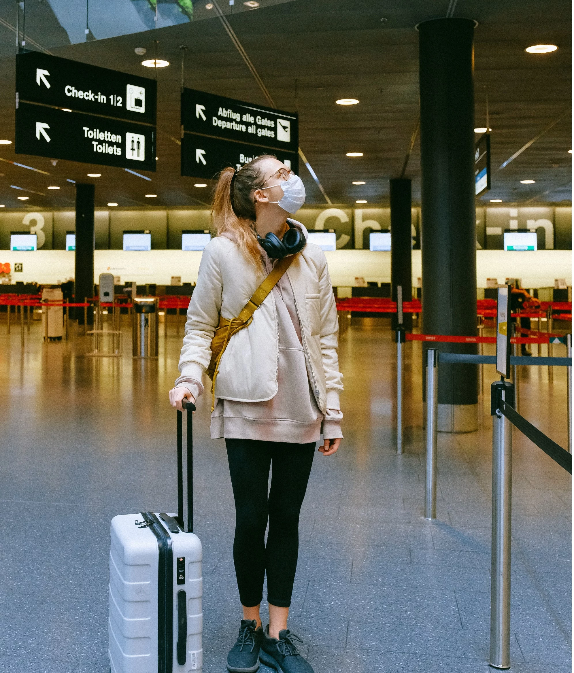 Woman Wearing Face Mask At Airport 3943883 (2)
